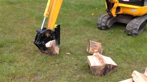 mini excavator thumb wood splitter|log splitters for mini excavators.